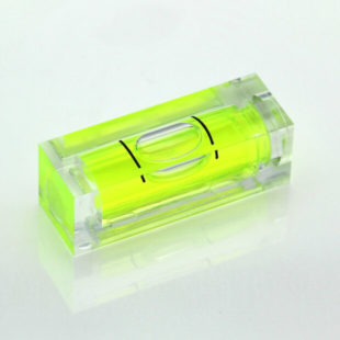 SC29 – Plastic sq. section vial, 29x10x10mm, green liquid